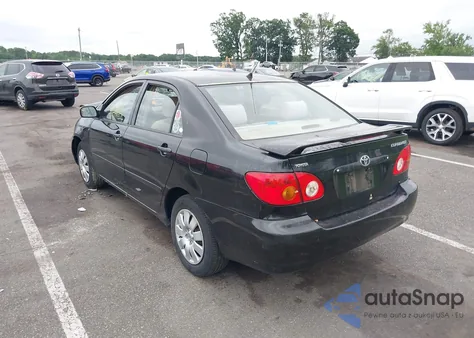 2003 Toyota Corolla Le z USA, uszkodzony, nr VIN JTDBR32E130022943